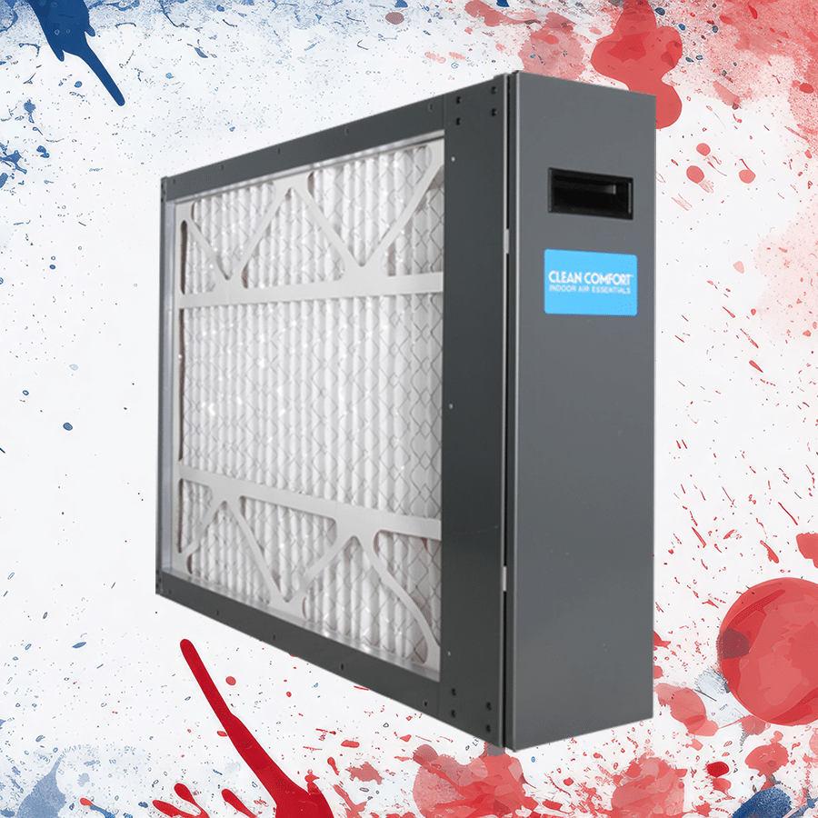 A rectangular air filtration unit with a metal frame and mesh filter is displayed against a background with red and blue paint splatters. A blue label on the unit reads "CLEAN COMFORT INDOOR AIR ESSENTIALS," highlighting Indoor Air Quality Services.